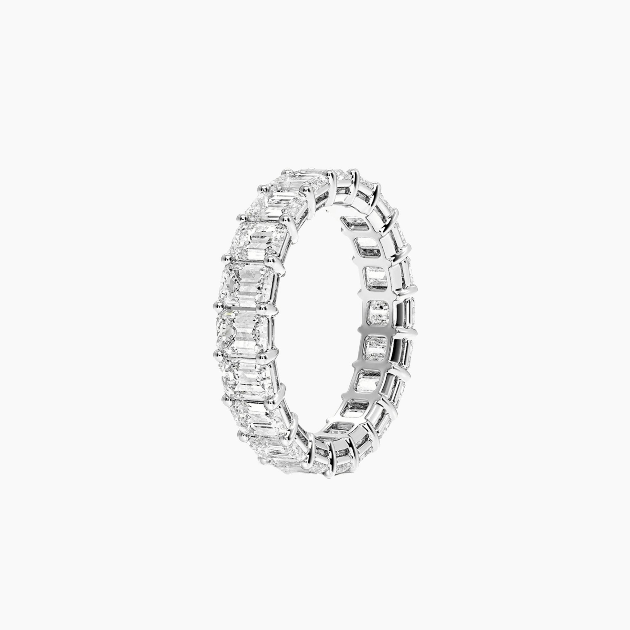 6 ct emerald-cut moissanite eternity ring in white gold vermeil, side view.
