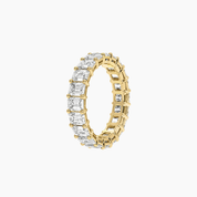 6 ct emerald-cut moissanite eternity ring in yellow gold vermeil, side view.
