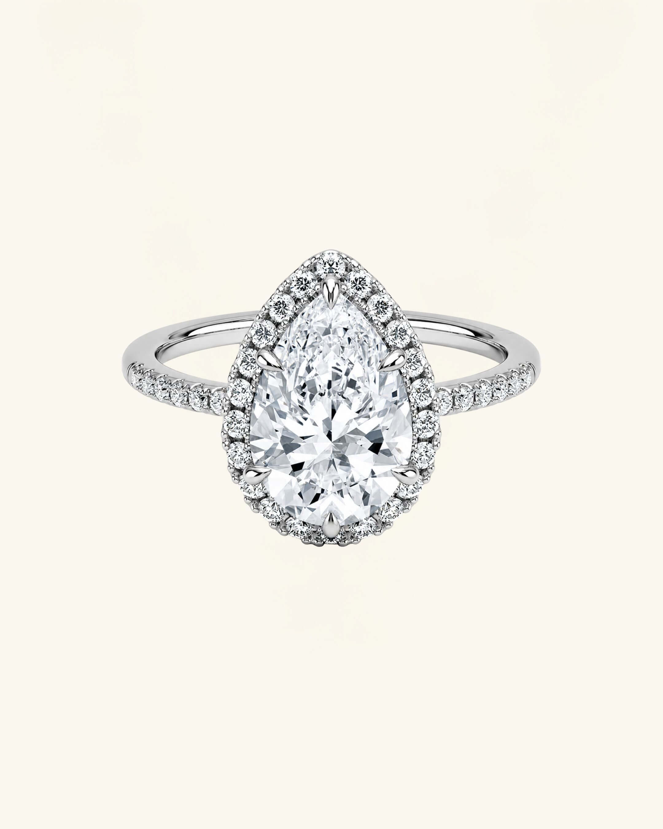Pear Cut Moissanite Halo Pavé Ring