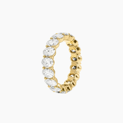 7 ct oval-cut moissanite eternity ring in yellow gold vermeil, side view.