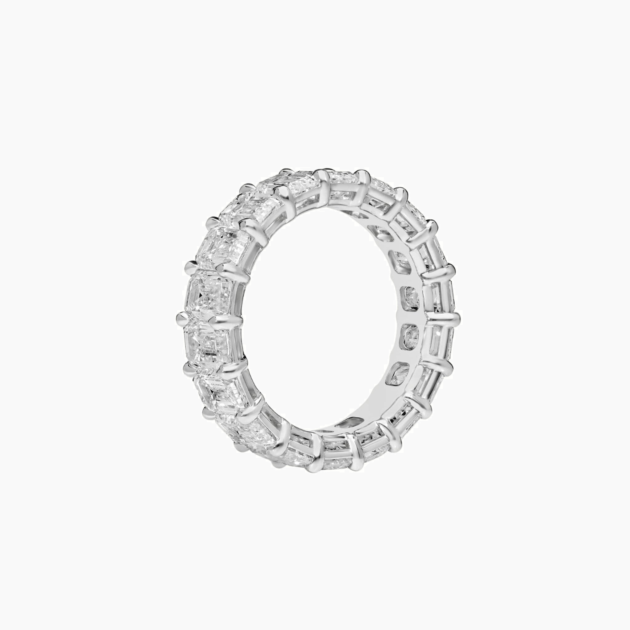 9 ct emerald-cut moissanite eternity ring in white gold vermeil, side view.