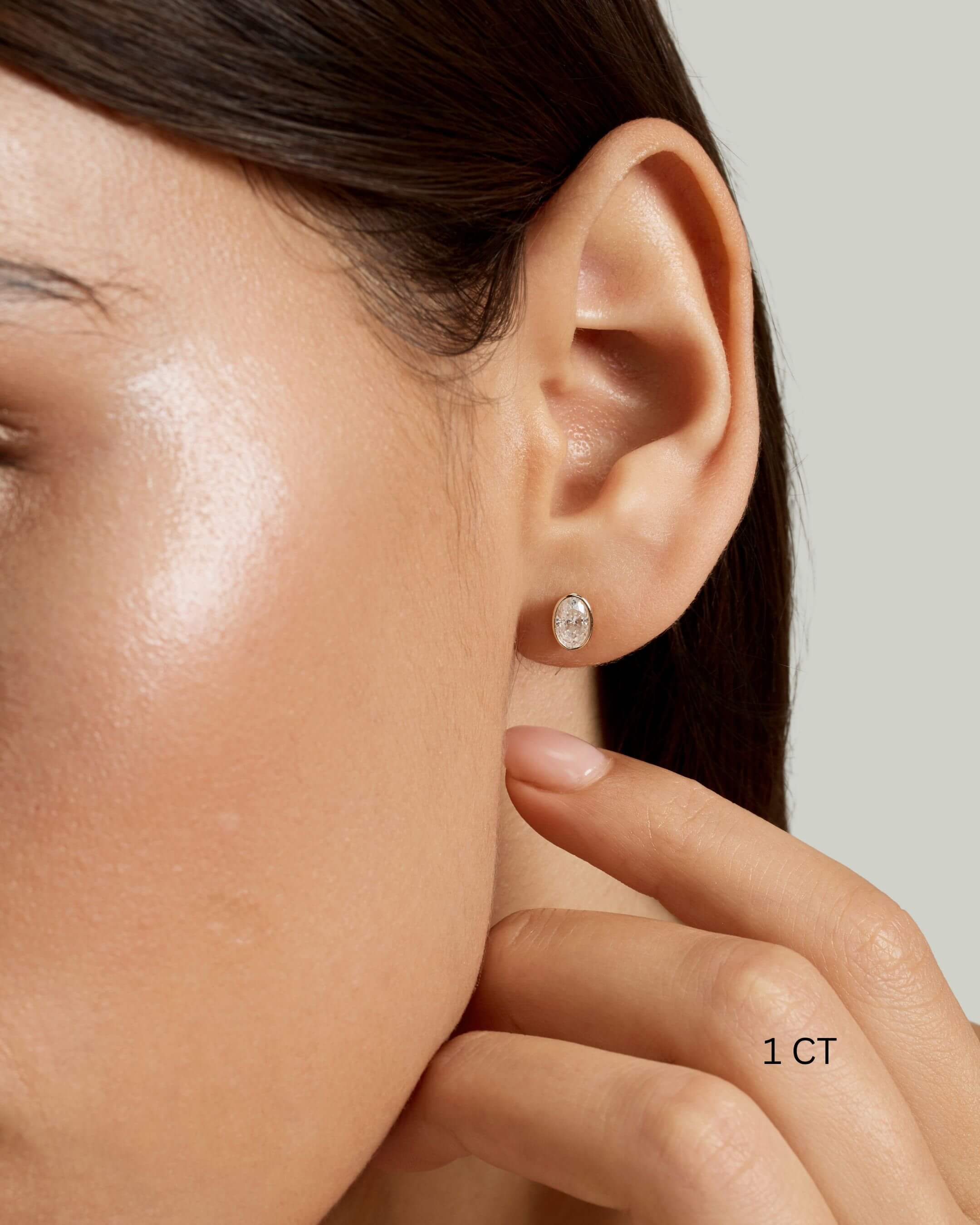 Oval Cut Bezel Moissanite Stud Earrings