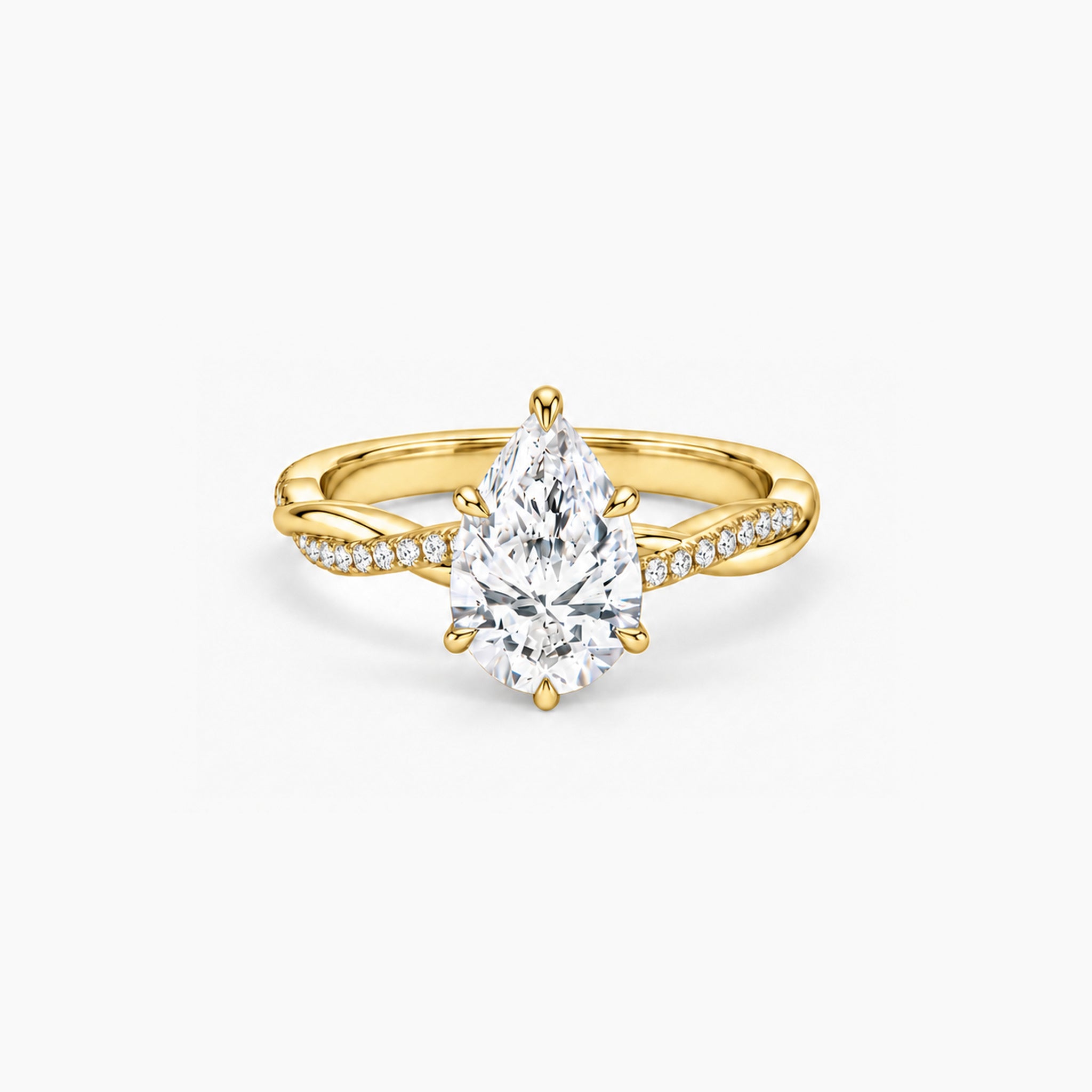 2 ct Pear-cut moissanite twisted pavé ring in 18k yellow gold vermeil, front studio view
