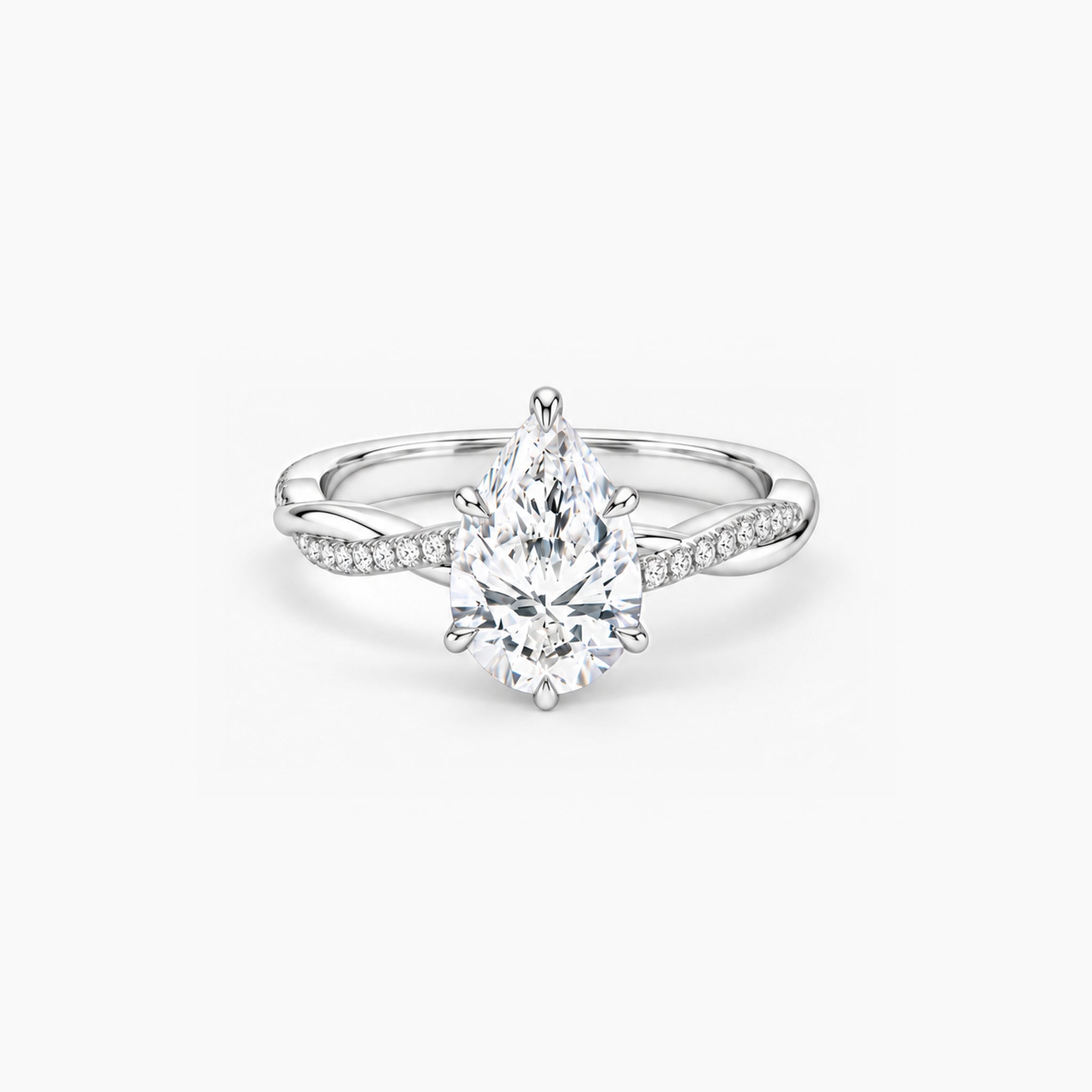 2 ct Pear-cut moissanite twisted pavé ring in 18k white gold vermeil, front studio view