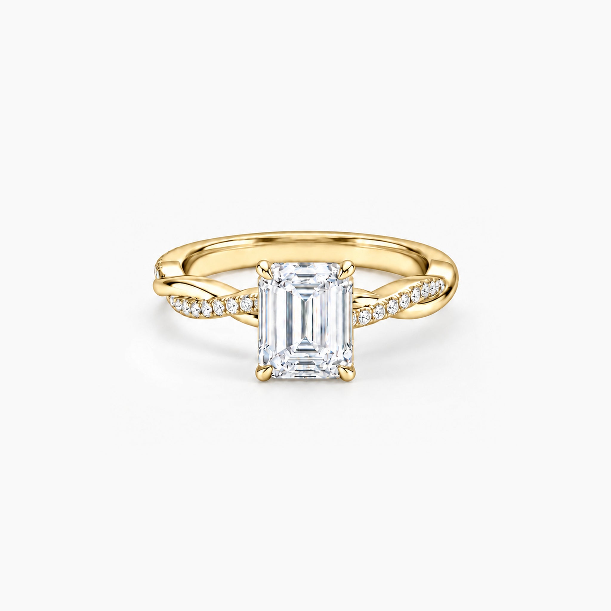 2 ct Emerald-cut moissanite twisted pavé ring in 18k yellow gold vermeil, front studio view