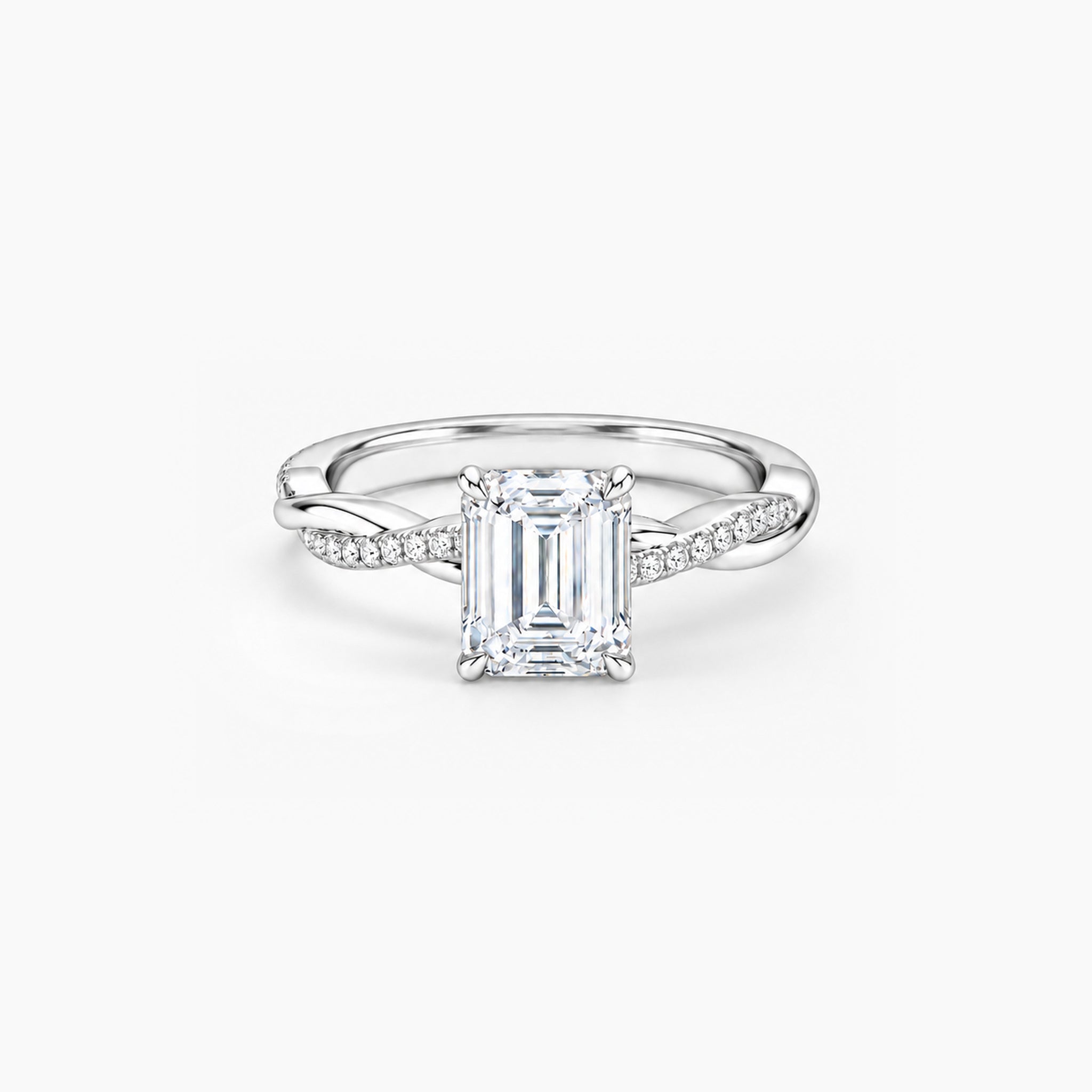 2 ct Emerald-cut moissanite twisted pavé ring in 18k white gold vermeil, front studio view