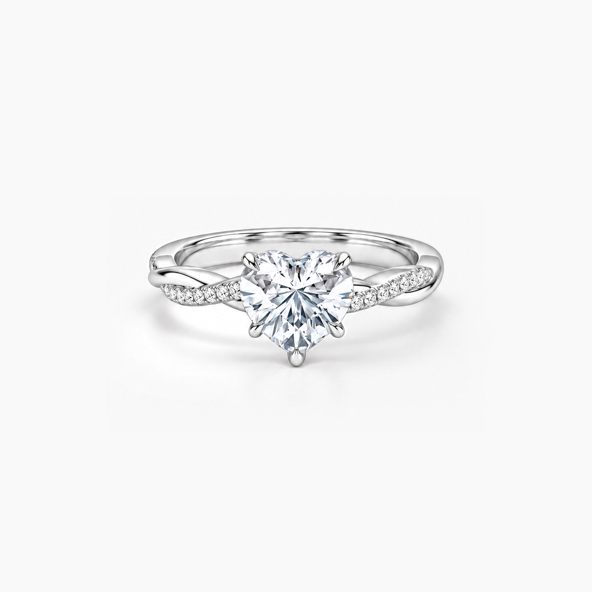 2 ct Heart-cut moissanite twisted pavé ring in 18k white gold vermeil, front studio view