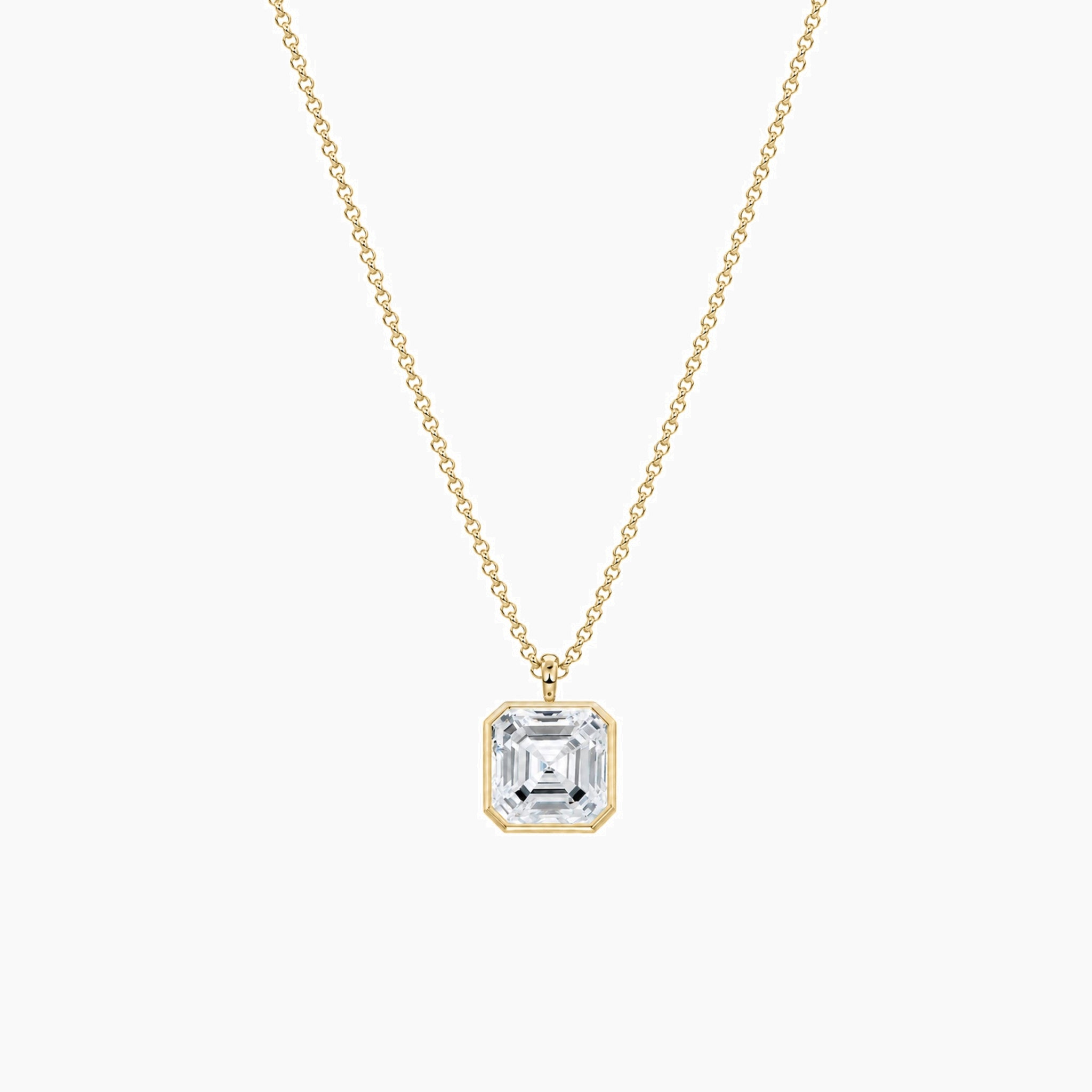 Asscher-cut moissanite bezel pendant necklace in yellow gold vermeil, full product view.
