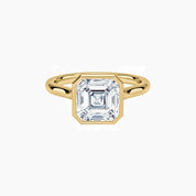 Asscher-cut moissanite bezel solitaire ring in yellow gold vermeil, front view.