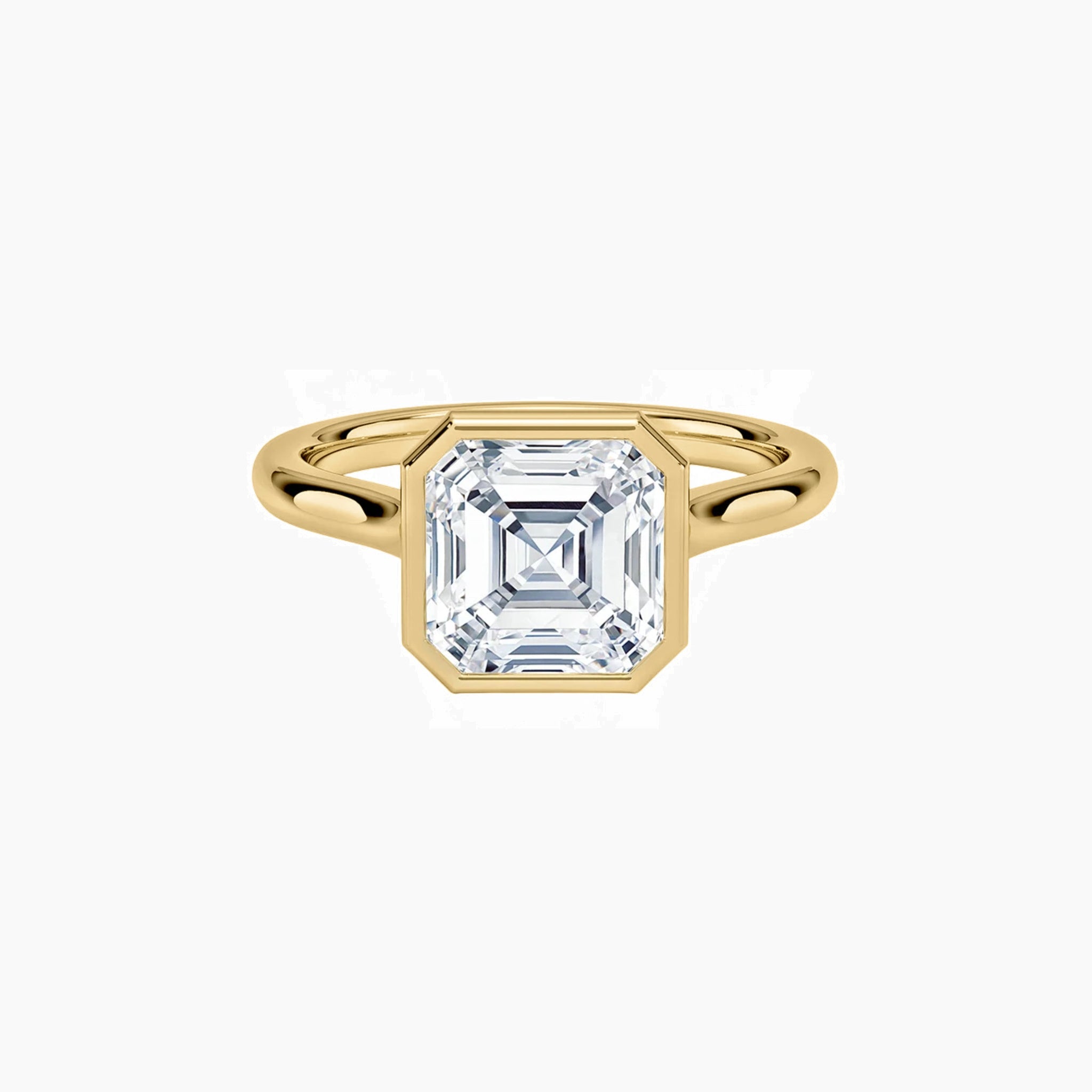 Asscher-cut moissanite bezel solitaire ring in yellow gold vermeil, front view.