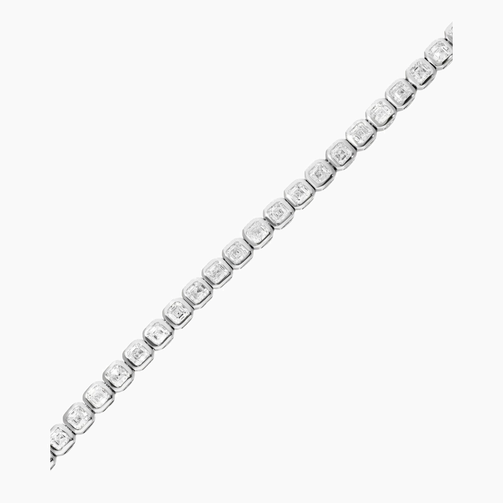 Asscher-cut moissanite bezel tennis bracelet in white gold vermeil, close-up detail.