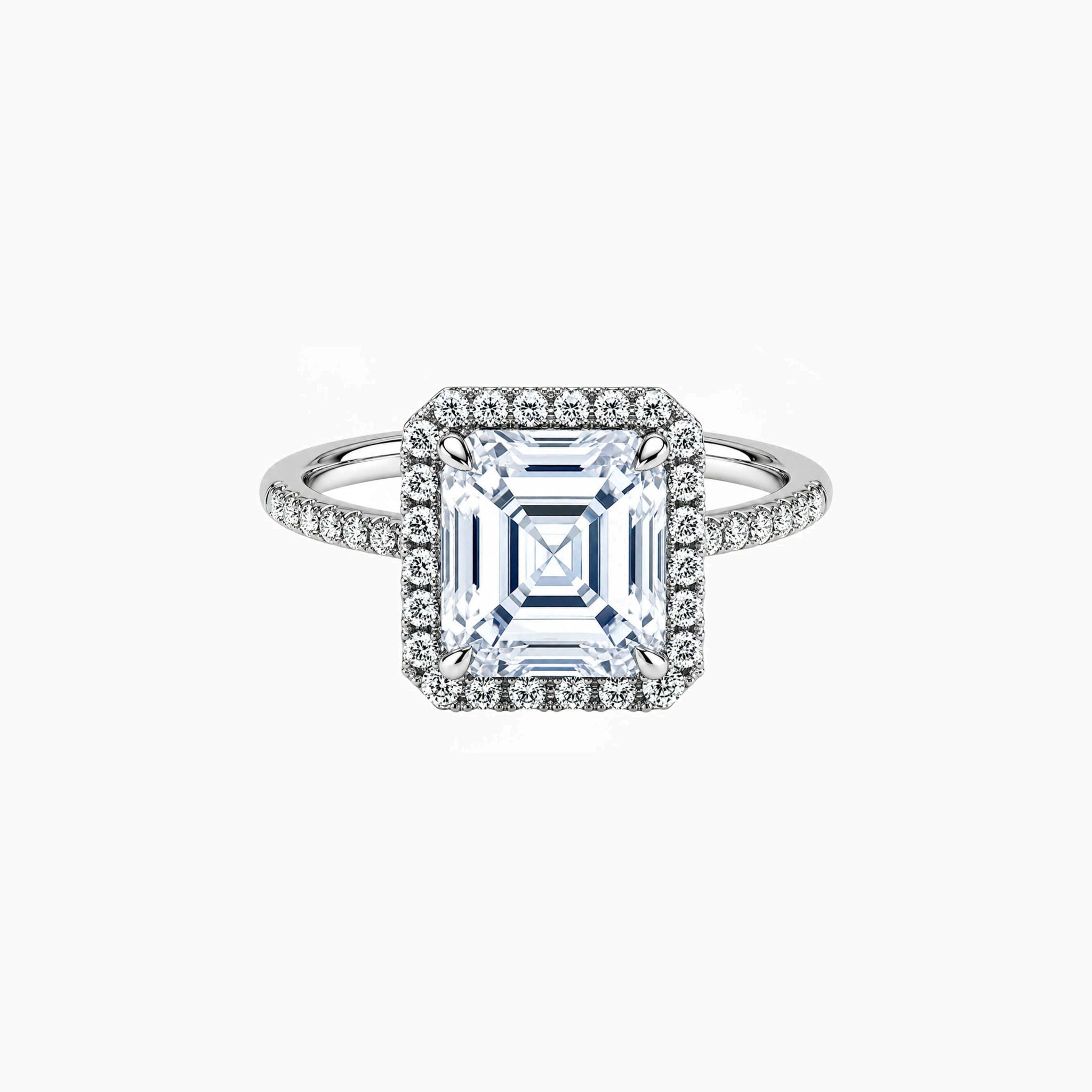 Asscher-cut moissanite halo ring with pavé band in white gold vermeil, front view.