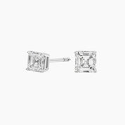 Asscher-cut moissanite stud earrings in white gold vermeil, front and side views.