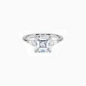Asscher-cut moissanite three-stone ring in white gold vermeil, front view.