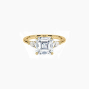 Asscher-cut moissanite three-stone ring in yellow gold vermeil, front view.