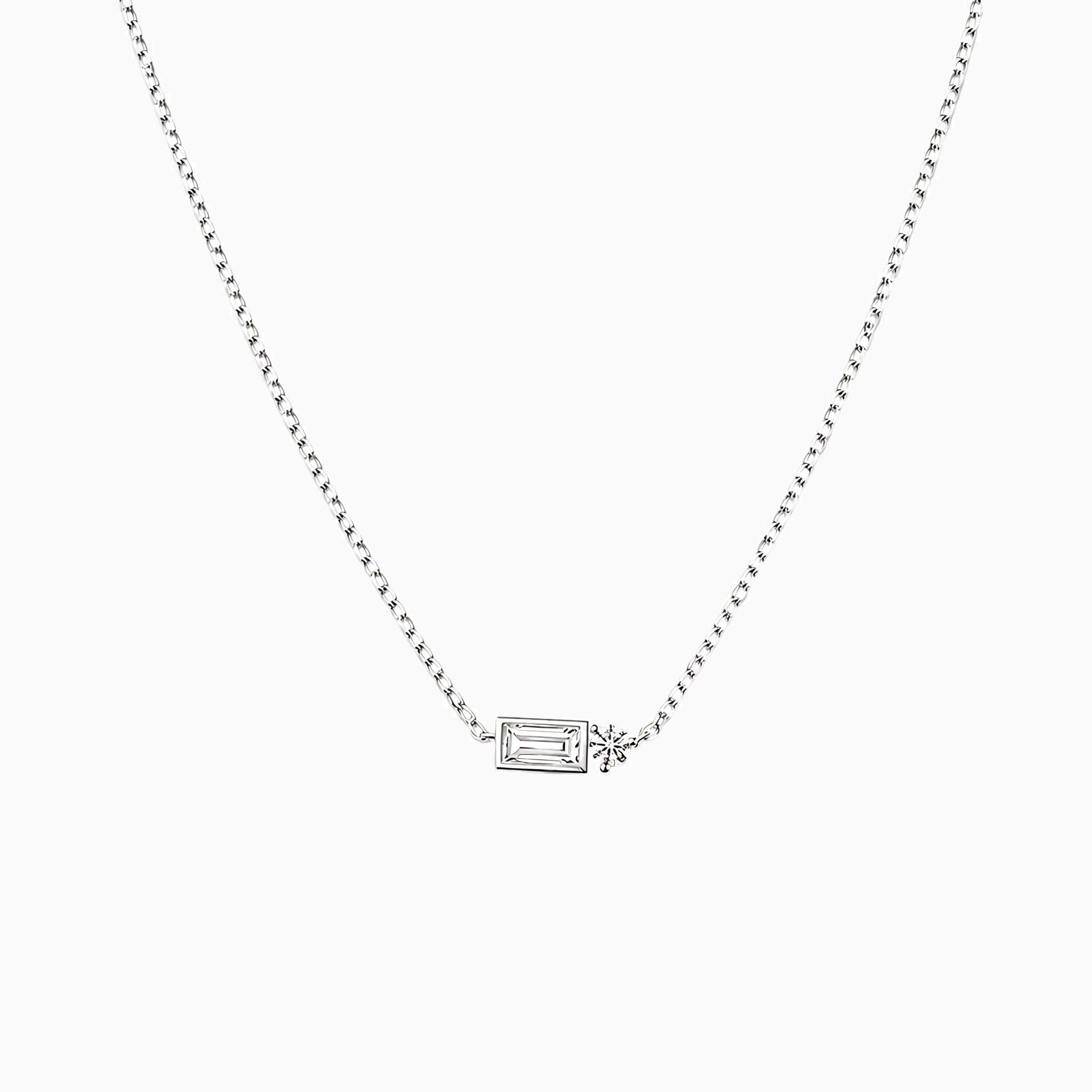 Baguette-cut and round-cut moissanite pendant necklace in white gold vermeil, front view.