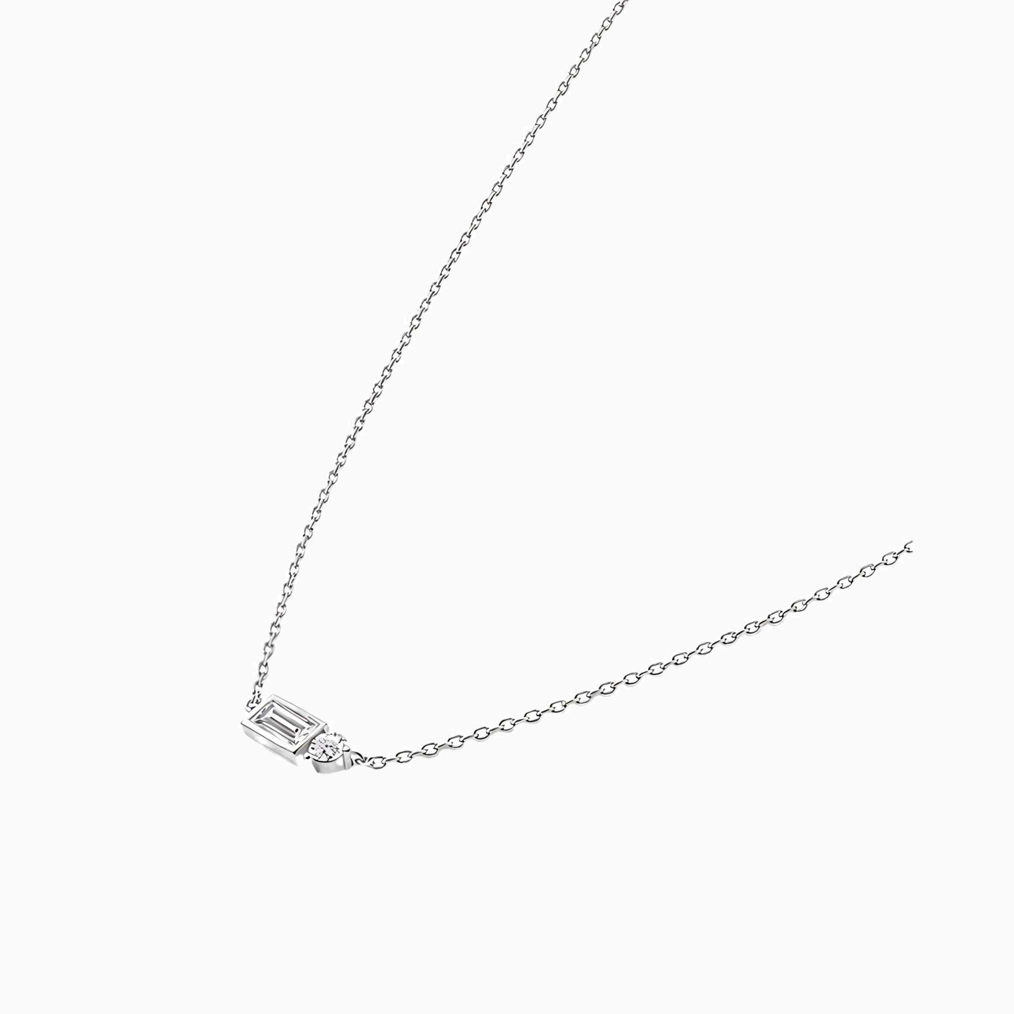 Baguette-cut and round-cut moissanite pendant necklace in white gold vermeil, side view.