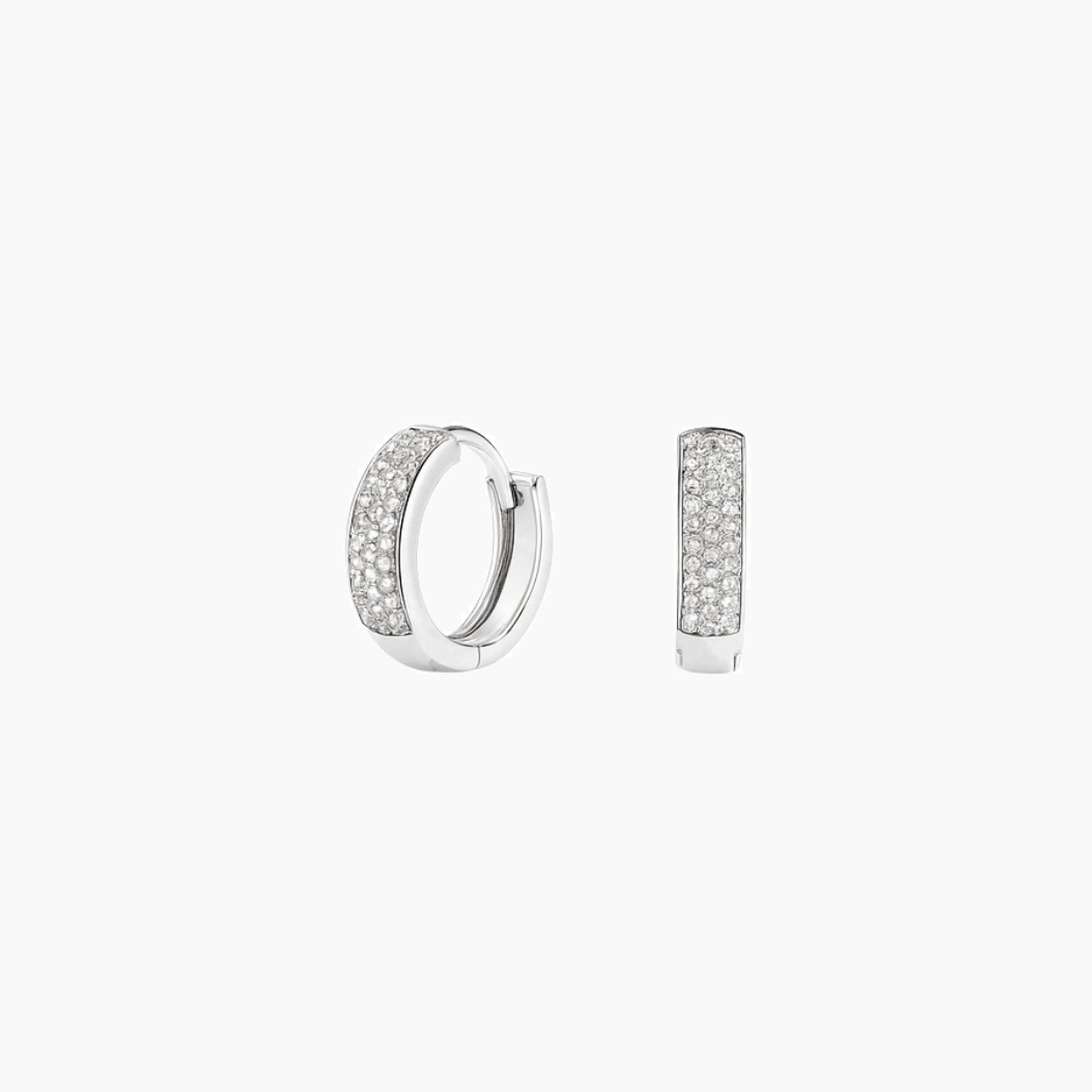 Bold pavé moissanite huggie hoop earrings in white gold vermeil, front and side views.
