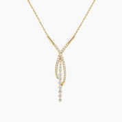 Crossover pavé moissanite drop necklace in yellow gold vermeil, full product view.