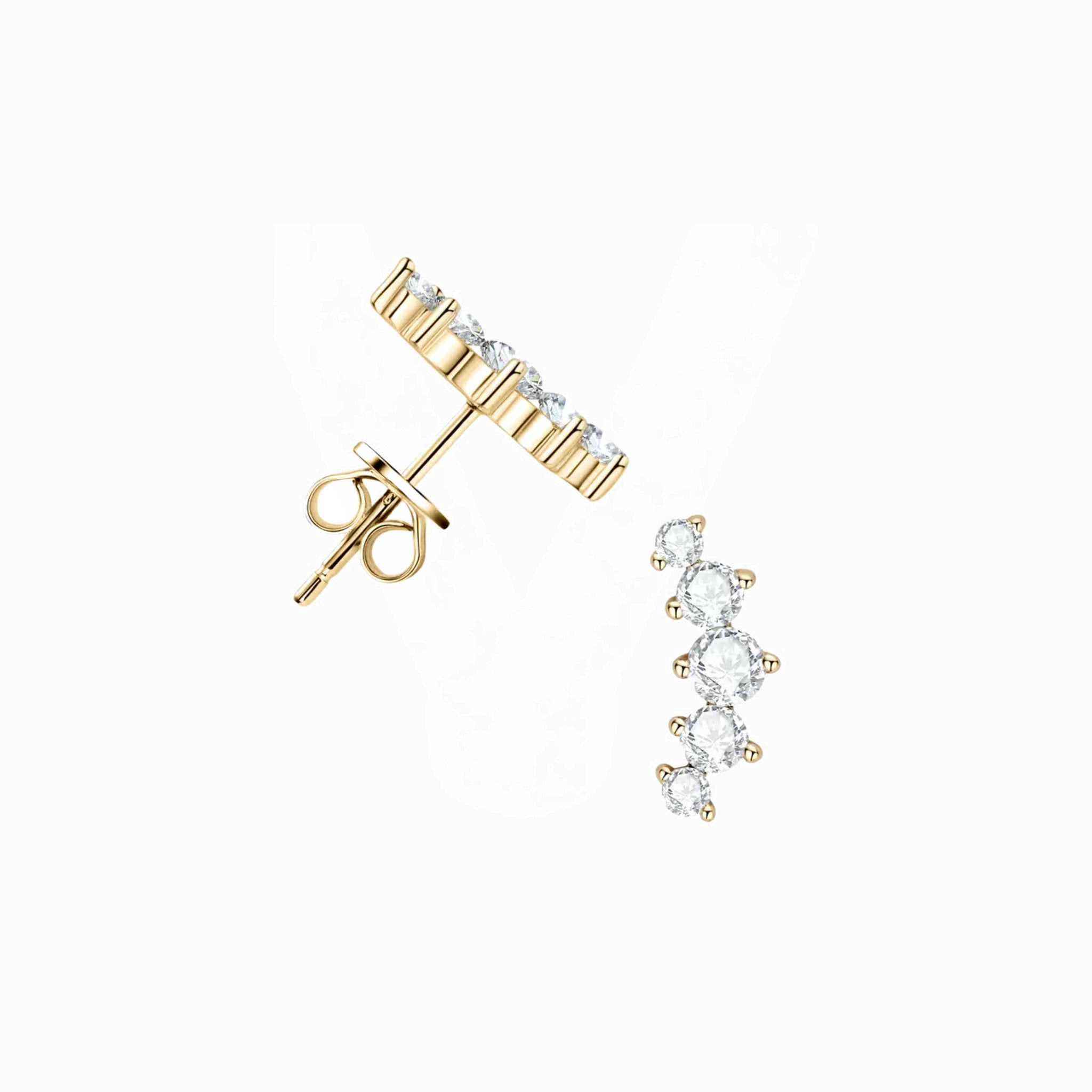 Curved moissanite stud earrings in yellow gold vermeil, angled view.