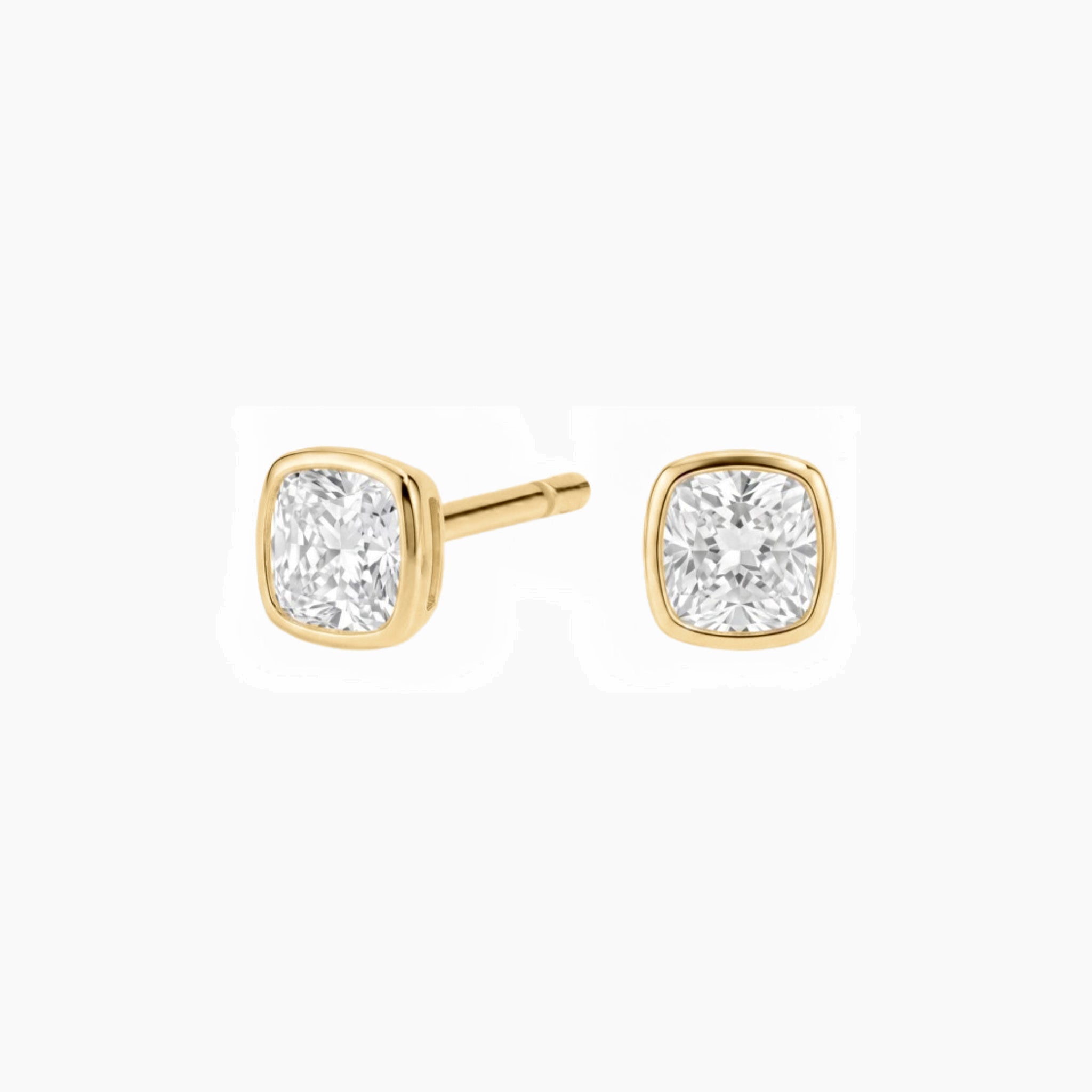 Cushion-cut moissanite bezel stud earrings in yellow gold vermeil, front and side views.