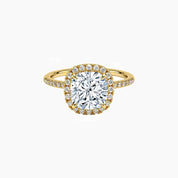 Cushion-cut moissanite halo ring with pavé band in yellow gold vermeil, front view.