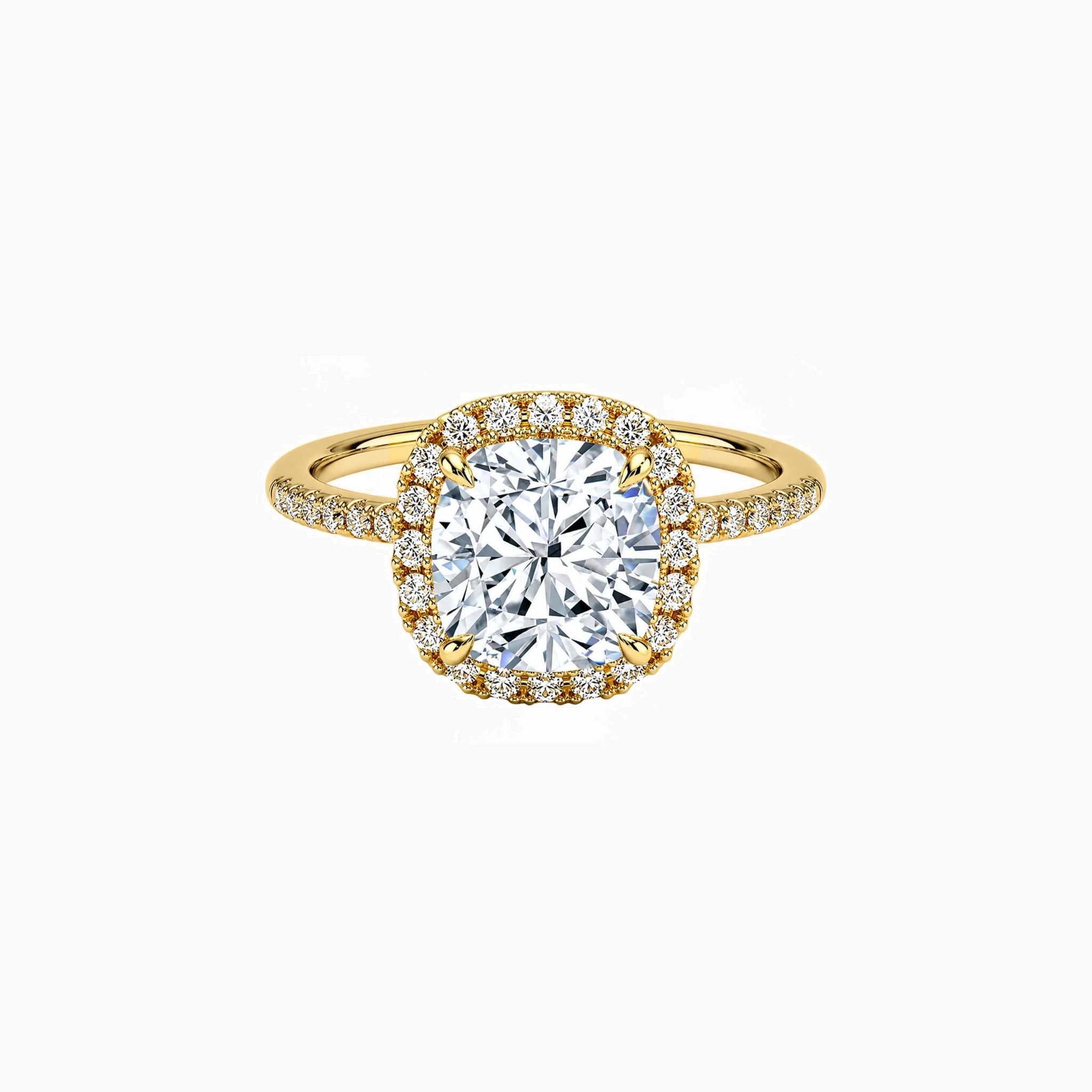 Cushion-cut moissanite halo ring with pavé band in yellow gold vermeil, front view.