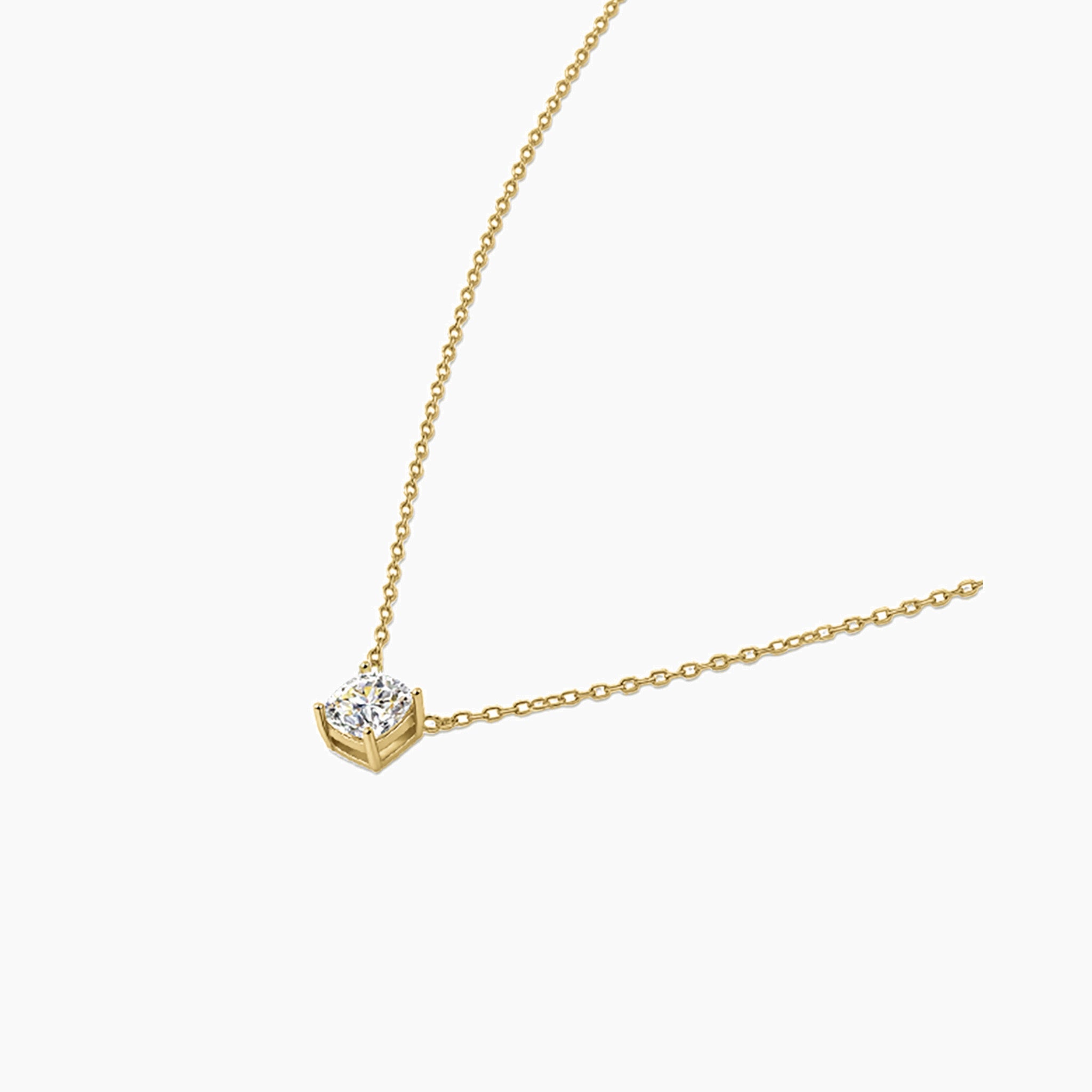 Cushion-cut moissanite pendant necklace in yellow gold vermeil, side view.