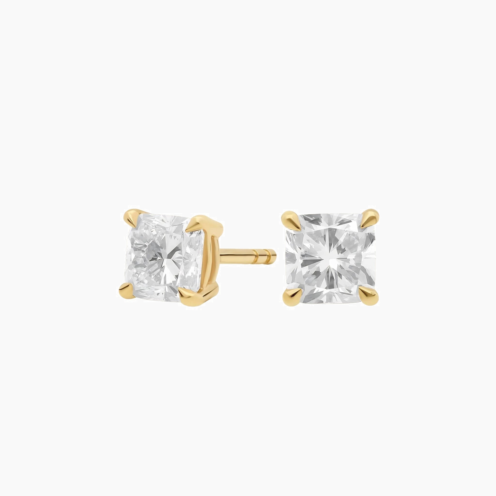 Cushion-cut moissanite stud earrings in yellow gold vermeil, front and side views.