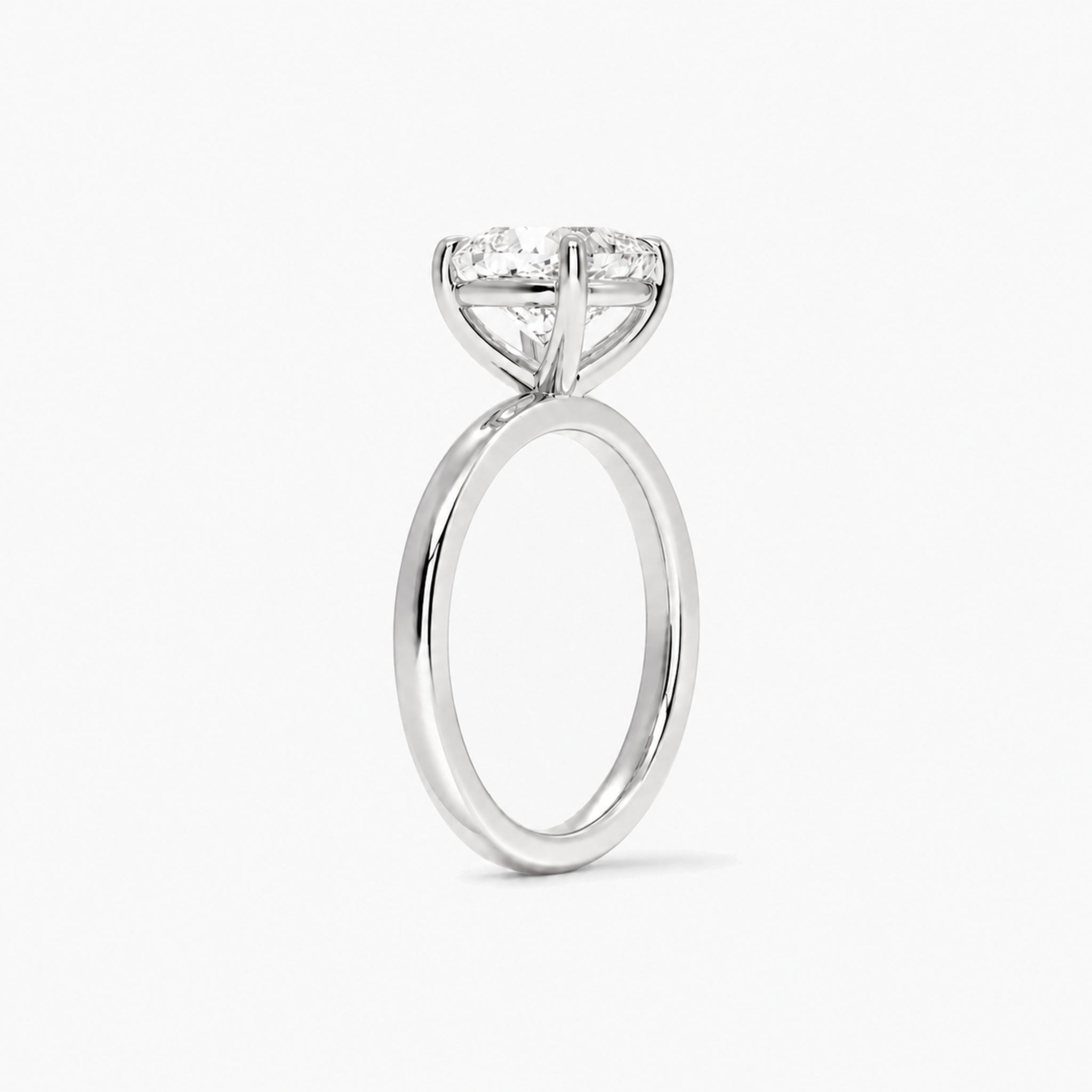 Cushion-Cut Moissanite Solitaire Ring in white gold, side view