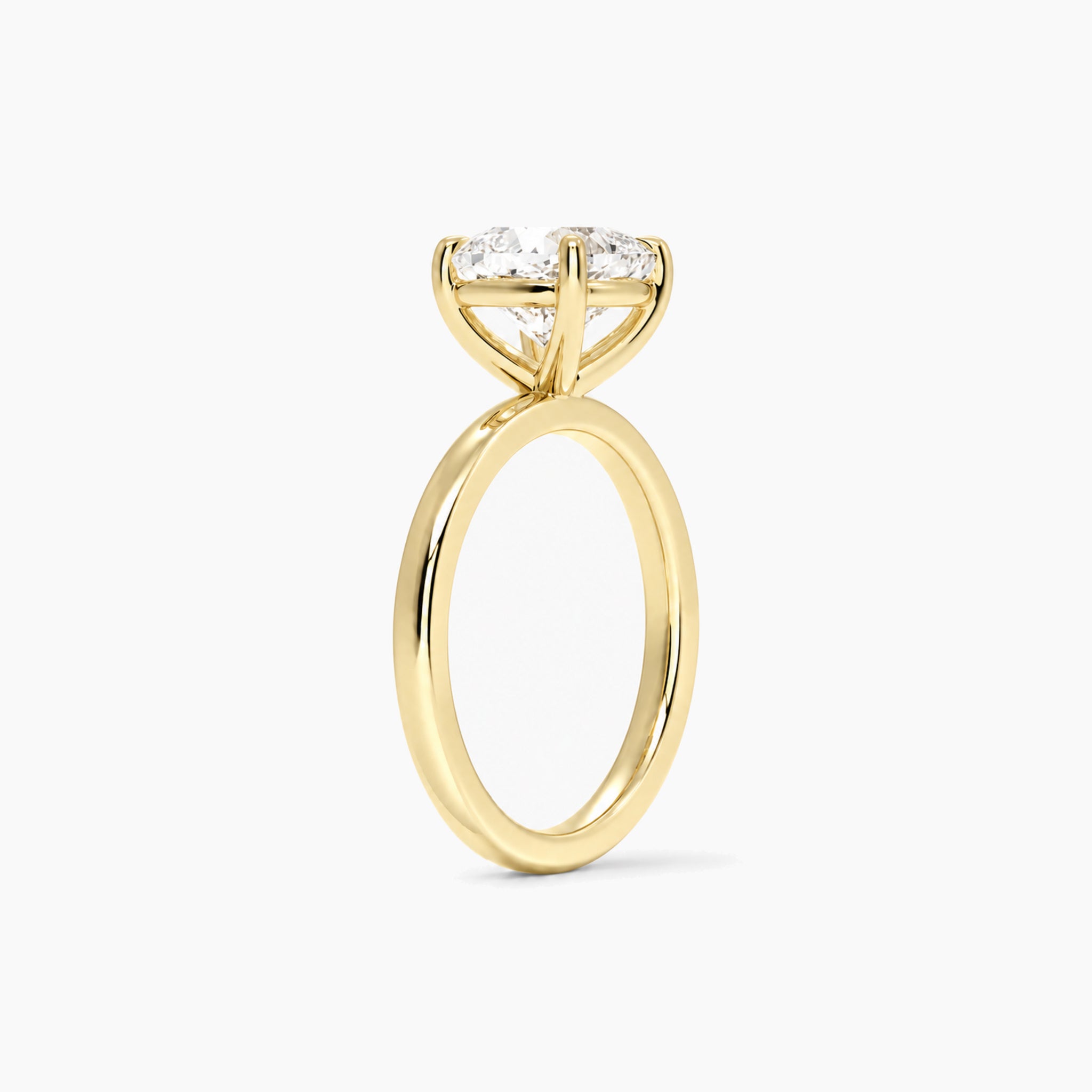 Cushion-Cut Moissanite Solitaire Ring in yellow gold, side view