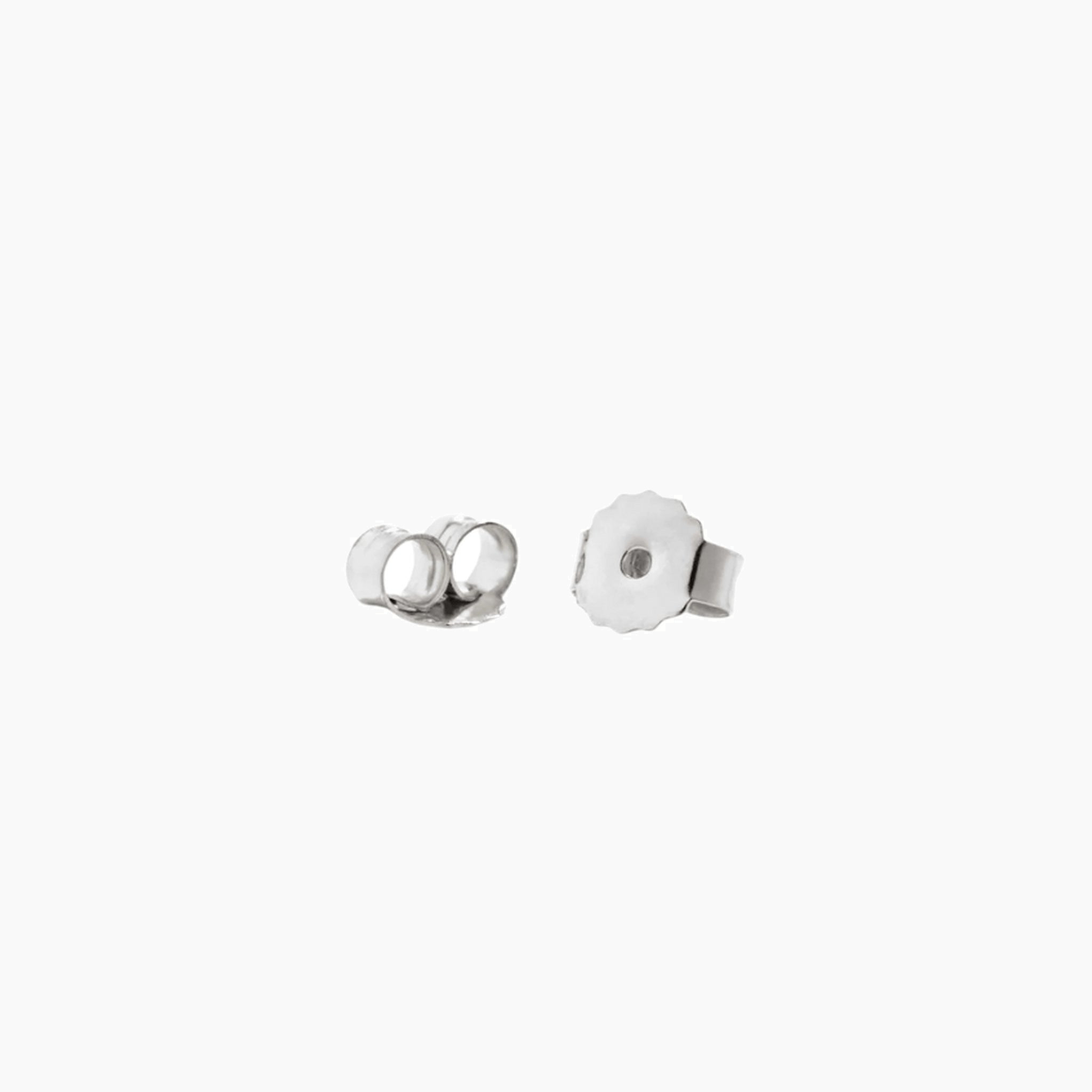 White gold vermeil earring posts and backs, close-up view.