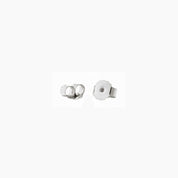 White gold vermeil earring posts and backs, close-up view.