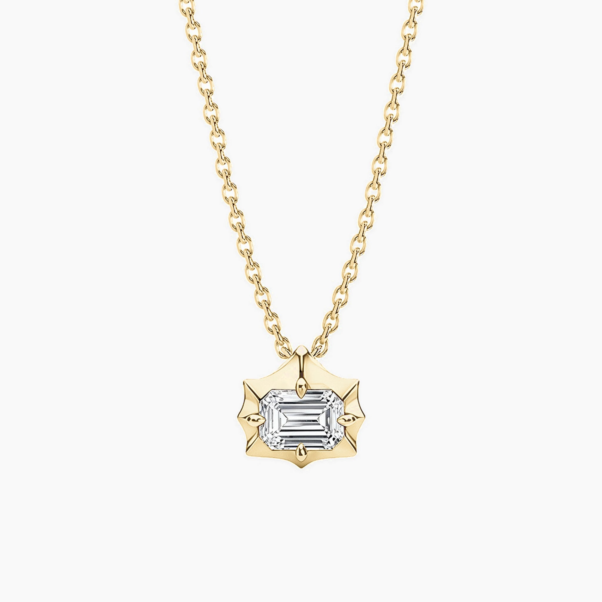 East-west emerald-cut moissanite pendant necklace in 18k yellow gold vermeil, front view.
