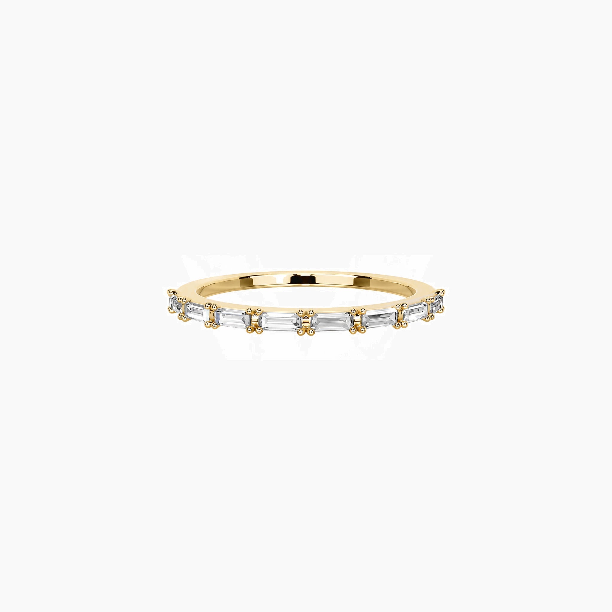 East-west emerald-cut moissanite half eternity ring in yellow gold vermeil, front view.