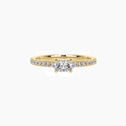 East-west marquise-cut moissanite solitaire ring with pavé band in yellow gold vermeil, front view.