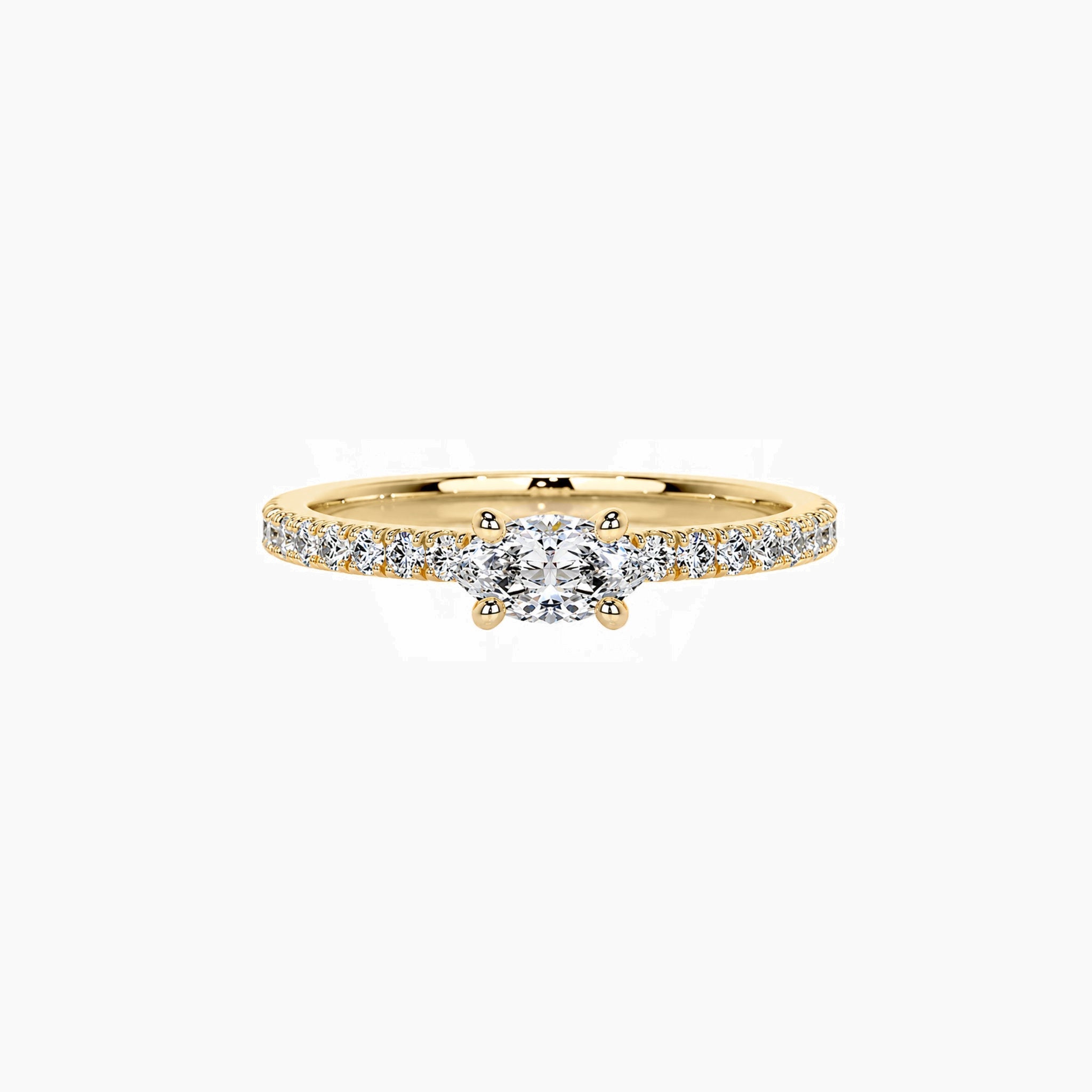 East-west marquise-cut moissanite solitaire ring with pavé band in yellow gold vermeil, front view.