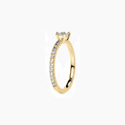 East-west marquise-cut moissanite solitaire ring with pavé band in yellow gold vermeil, side view.