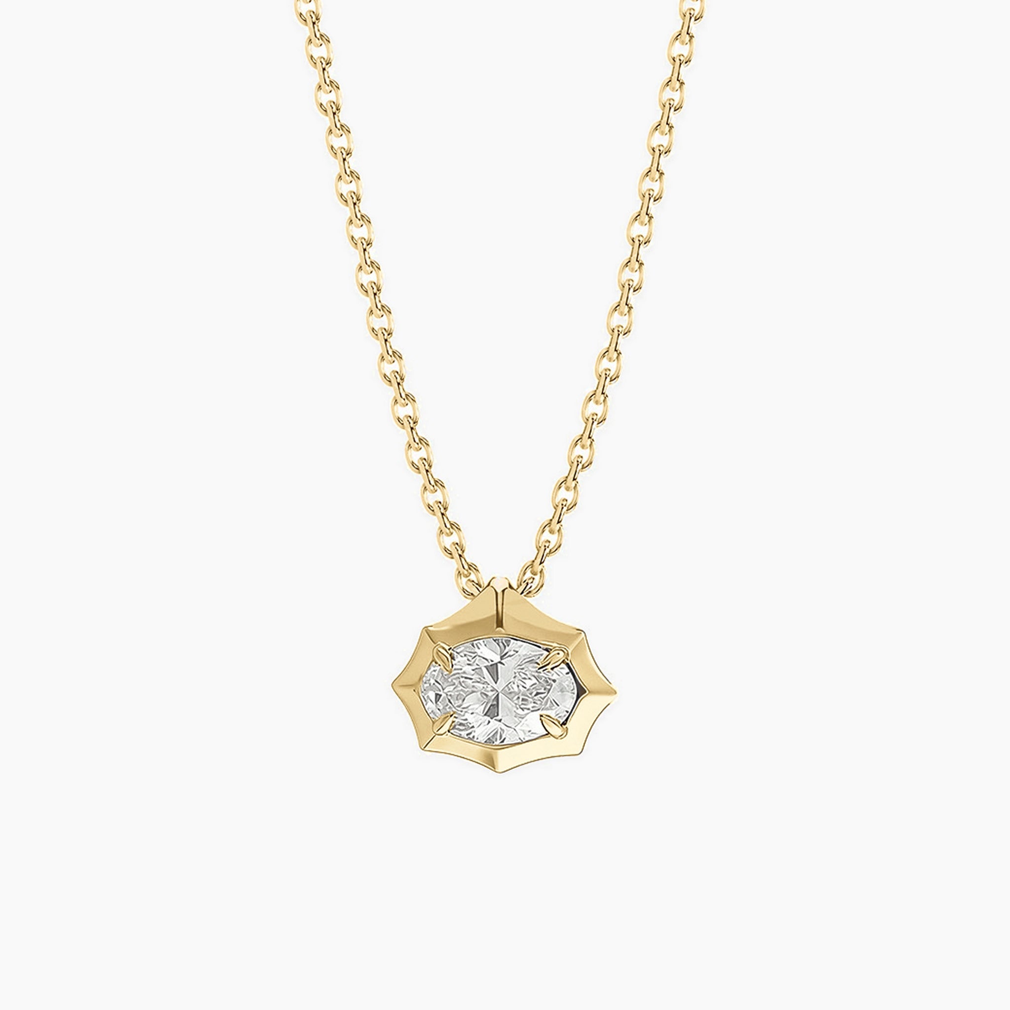 East-west oval-cut moissanite pendant necklace in 18k yellow gold vermeil, front view.