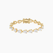 East-west pear-cut moissanite tennis bracelet in yellow gold vermeil, closed view.