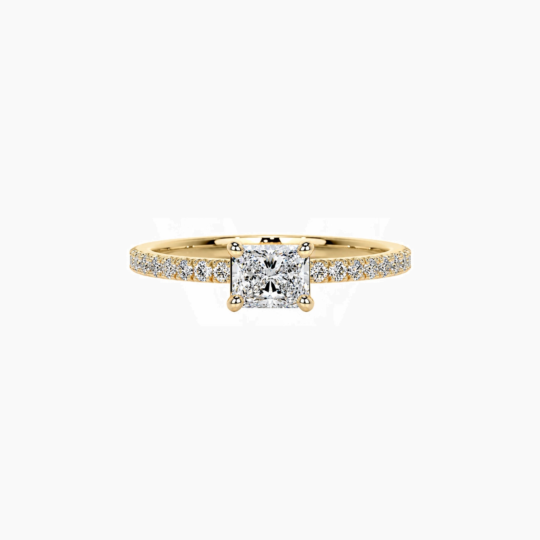 East-west radiant-cut moissanite solitaire ring with pavé band in yellow gold vermeil, front view.