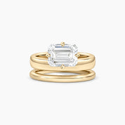 Emerald-cut moissanite double-band solitaire ring in yellow gold vermeil, front view.