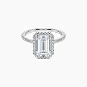 Emerald-cut moissanite halo ring with pavé band in white gold vermeil, front view.