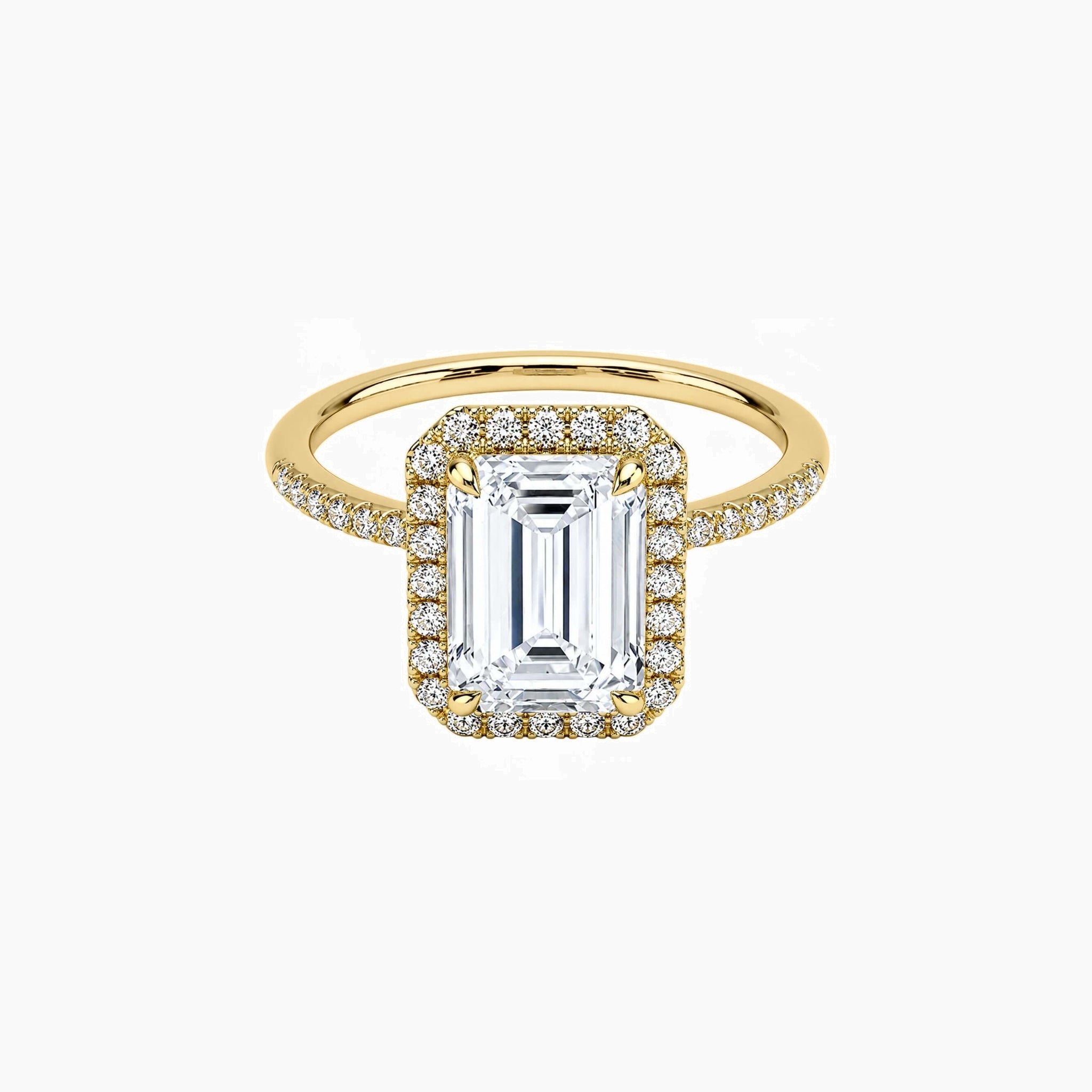 Emerald-cut moissanite halo ring with pavé band in yellow gold vermeil, front view.