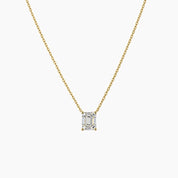 Emerald-cut moissanite pendant necklace in yellow gold vermeil, front view.