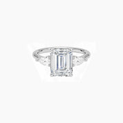 Emerald-cut moissanite three-stone ring in white gold vermeil, front view.