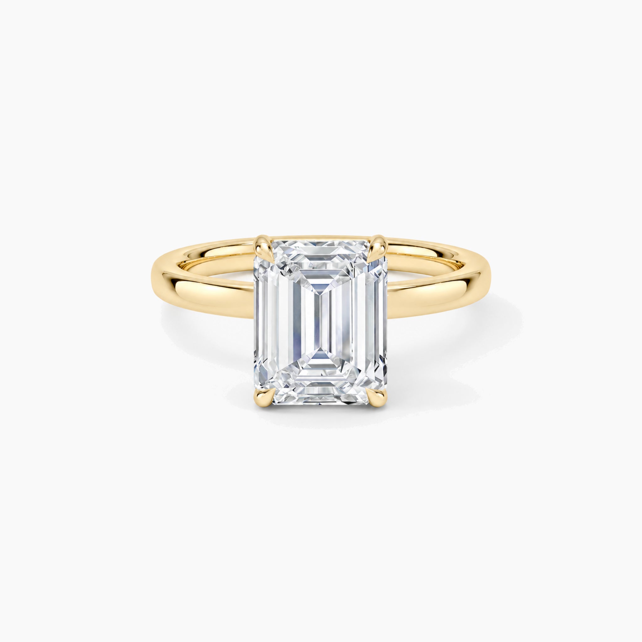 emerald-cut moissanite solitaire ring in yellow gold vermeil, front view