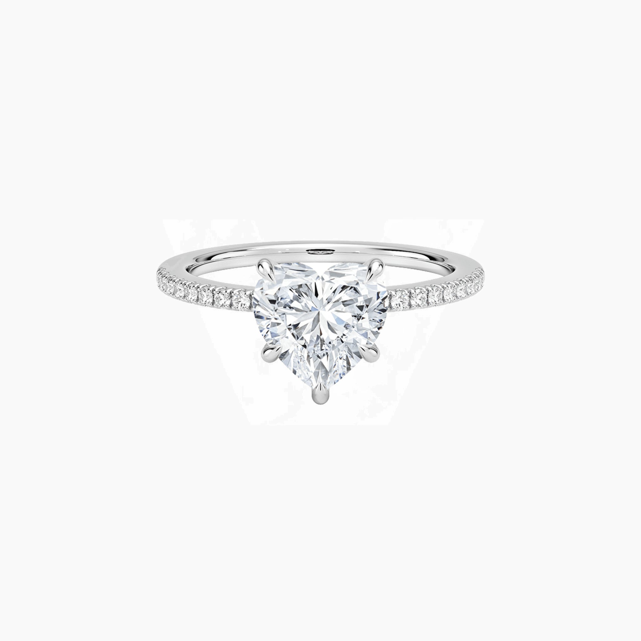 Heart-cut moissanite hidden halo ring with pavé band in white gold vermeil, front view.