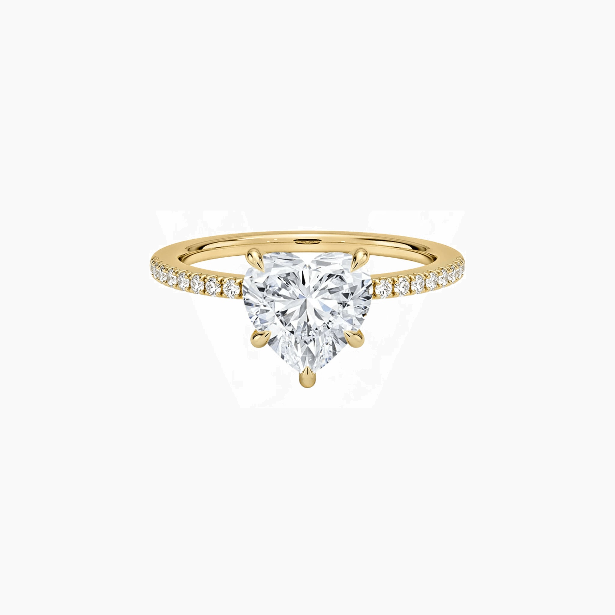Heart-cut moissanite hidden halo ring with pavé band in yellow gold vermeil, front view.