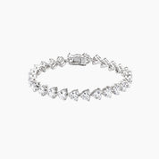 Heart-cut moissanite tennis bracelet in white gold vermeil, closed view.